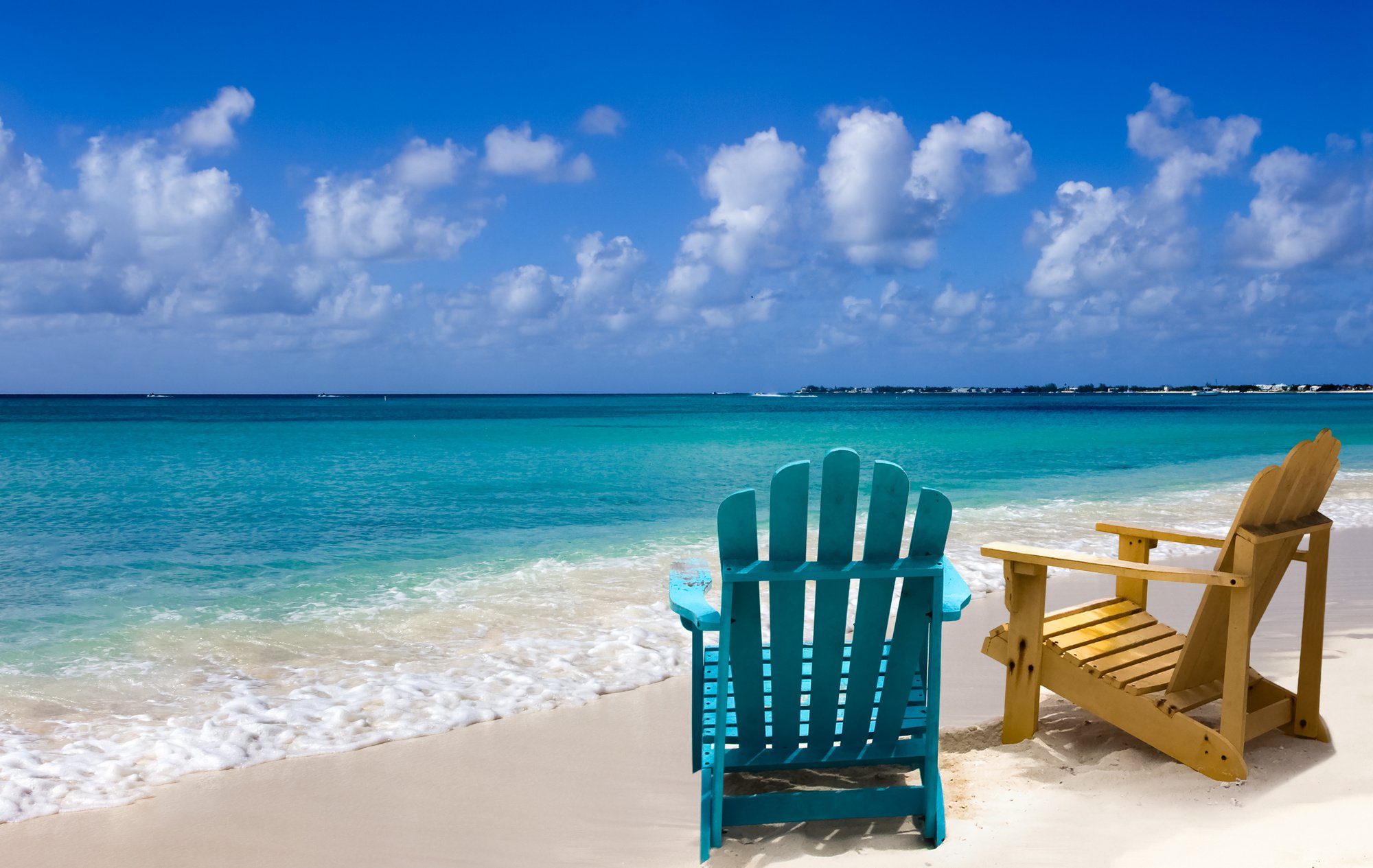 Wooden beach chairs on Caribbean coast